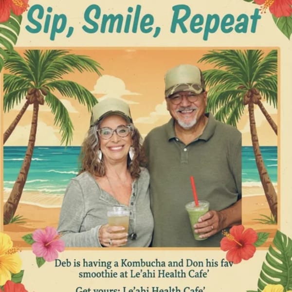 Smiling couple, Deb and Don, holding a kombucha and a green smoothie at Leahi Health.
